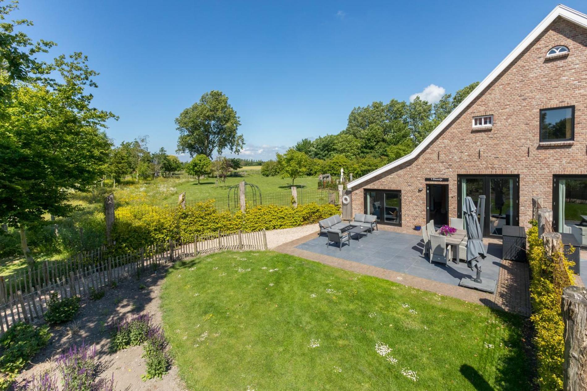 Vakantiehuis - Lepelstraat 18A: 't Blauwtje Vrouwenpolder Buitenkant foto